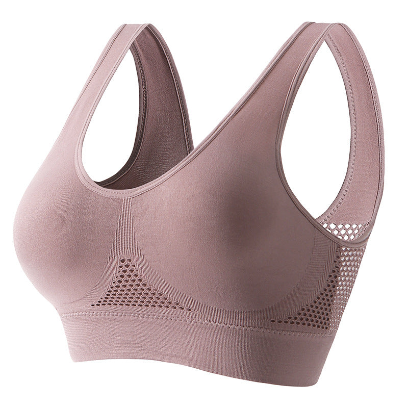 Women's push-up breathable sports bra in sweat-wicking athletic fabric with wireless bust support