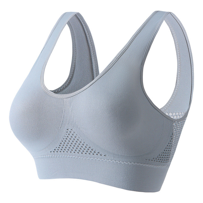 Women's push-up breathable sports bra in sweat-wicking athletic fabric with wireless bust support