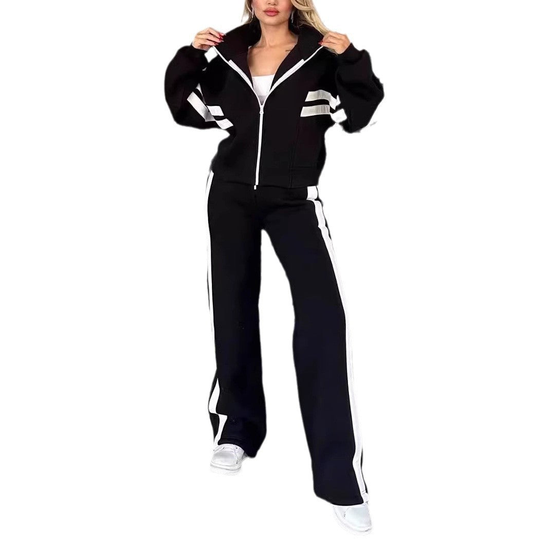 Women's white two-piece casual sportswear tracksuit set with loose shirt and pants