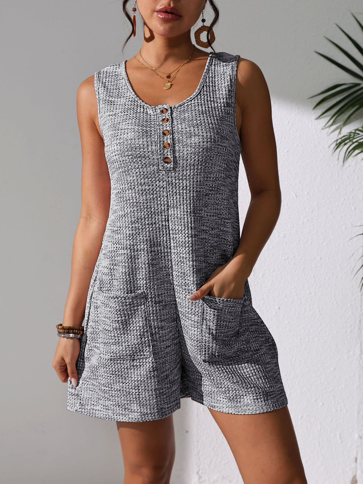 women's casual button pocket vest jumpsuit with relaxed legs and functional pockets