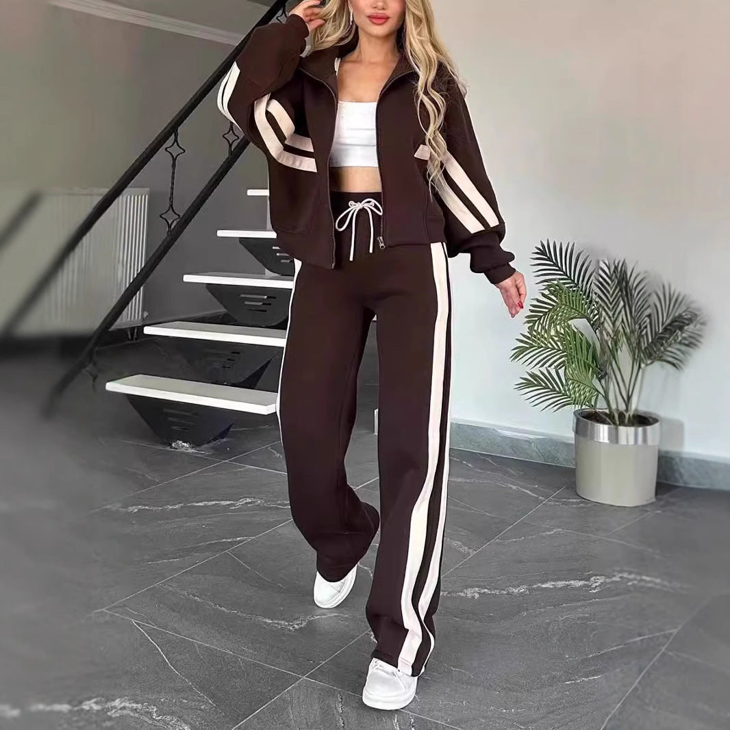 Women's white two-piece casual sportswear tracksuit set with loose shirt and pants