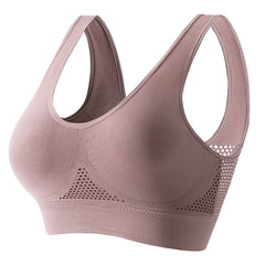 Women's push-up breathable sports bra in sweat-wicking athletic fabric with wireless bust support