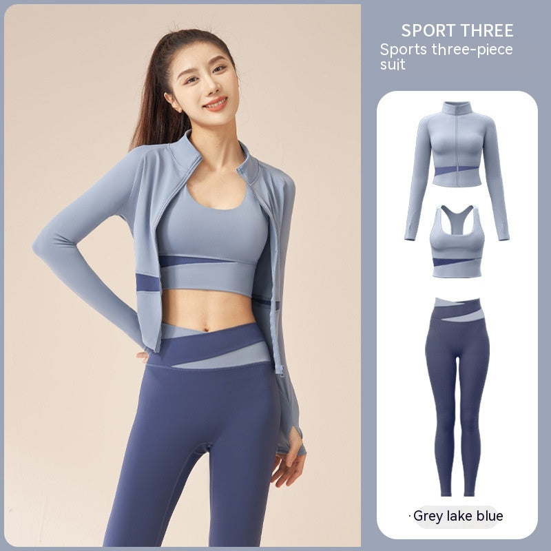 Women's 3-piece workout tracksuit set with zip jacket, sports bra, and yoga trousers