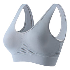 Women's push-up breathable sports bra in sweat-wicking athletic fabric with wireless bust support
