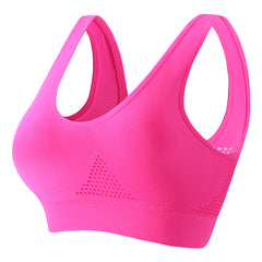 Women's push-up breathable sports bra in sweat-wicking athletic fabric with wireless bust support