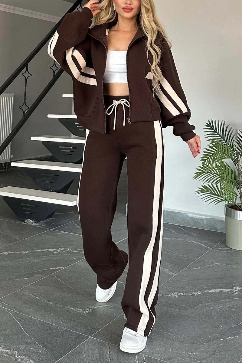 Women's white two-piece casual sportswear tracksuit set with loose shirt and pants