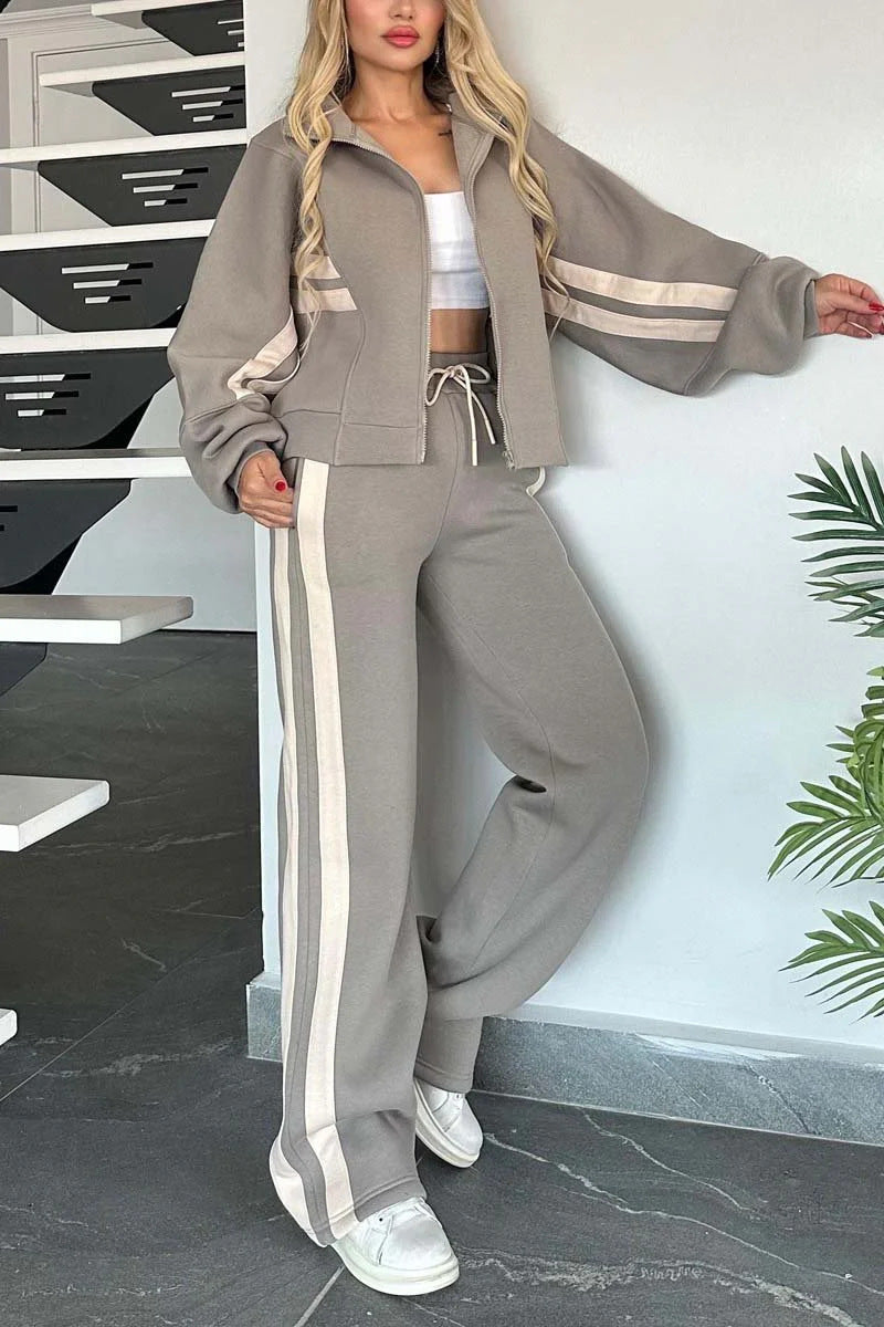 Women's white two-piece casual sportswear tracksuit set with loose shirt and pants