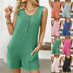 Model wearing a solid color sleeveless summer short jumpsuit romper with side pockets and a casual round neckline