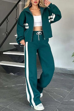Women's white two-piece casual sportswear tracksuit set with loose shirt and pants