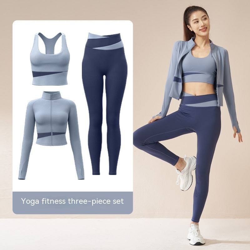 Women's 3-piece workout tracksuit set with zip jacket, sports bra, and yoga trousers