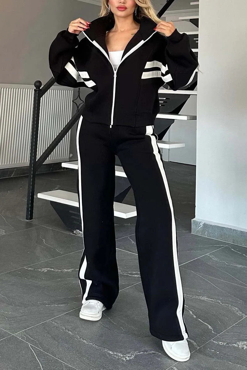 Women's white two-piece casual sportswear tracksuit set with loose shirt and pants