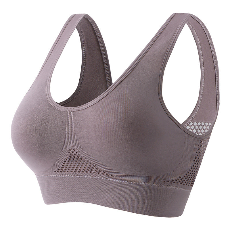 Women's push-up breathable sports bra in sweat-wicking athletic fabric with wireless bust support