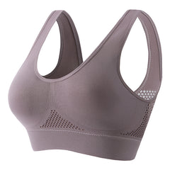 Women's push-up breathable sports bra in sweat-wicking athletic fabric with wireless bust support